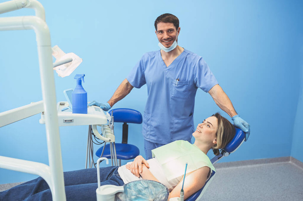 stock photo dentist examining patient teeth using dental equipment dentistry office stomatology